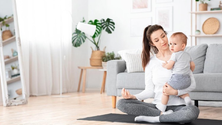 Young Mom Meditating With Baby On Arms, Practicing Yoga At Home, Free Space
