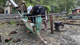 FOTO : Topan Molave Hantam Filipina Topan Molave menghantam Filipina pada Senin (26/10), memicu banjir dan merusak rumah penduduk.