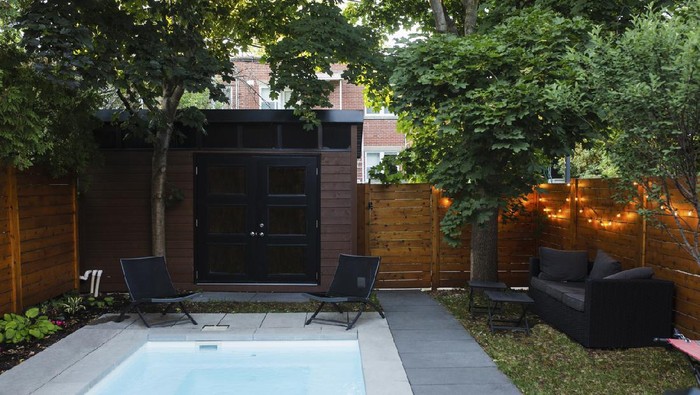 Front of back yard, swimming pool, house,  small