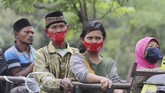 FOTO : Wajah Pengungsi Lereng Gunung Merapi Sejumlah warga yang tinggal di kaki Merapi mengungsi terkait peningkatan status gunung itu. Berikut gambarannya.