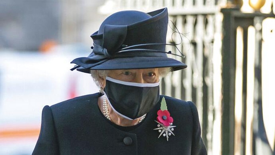 Britain's Queen Elizabeth II attends a ceremony to mark the centenary of the burial of the Unknown Warrior, in Westminster Abbey, London, Wednesday, Nov. 4, 2020. Queen Elizabeth II donned a face mask in public for the first time during the coronavirus pandemic when attending a brief ceremony at Westminster Abbey last week to mark the centenary of the burial of the Unknown Warrior. While the 94-year-old has been seen in public on several occasions over the past few months, she has not worn a face covering. (Aaron Chown/Pool Photo via AP)