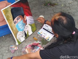Lukis Pahlawan Bermasker, Komunitas Pelukis Tebar Pesan Perjuangan Lawan COVID-19