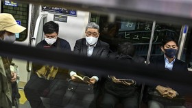 Lonjakan Covid di Jepang hingga Raja Malaysia Batalkan Pemilu