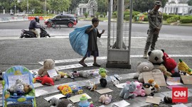 FOTO : Aksi Peringatan Hari Anak Sedunia di Monas