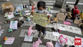 FOTO : Aksi Peringatan Hari Anak Sedunia di Monas Aksi massa Hari Anak Sedunia mengaku prihatin dengan kondisi Indonesia dan dunia di tengah krisis iklim akibat kebijakan yang mengabaikan lingkungan.