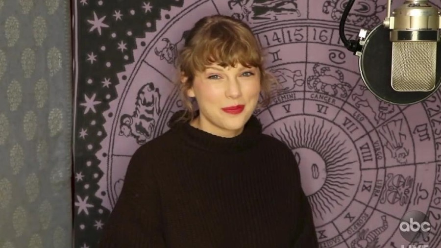 In this screen shot provided by ABC on Sunday, Nov. 22, 2020, Taylor Swift accepts the award for artist of the year at the American Music Awards at the Microsoft Theater in Los Angeles. (ABC via AP)