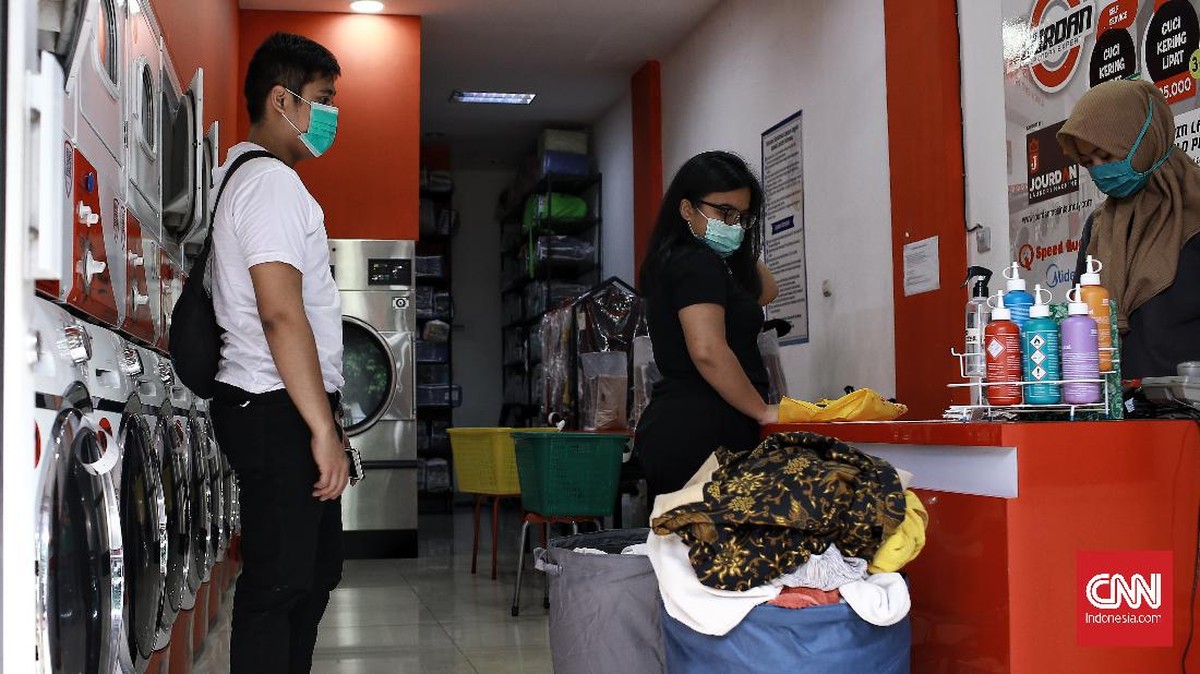 FOTO: Bisnis Laundry 'Kebanjiran' Konsumen Saat Musim Hujan