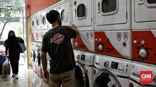 FOTO: Bisnis Laundry 'Kebanjiran' Konsumen Saat Musim Hujan