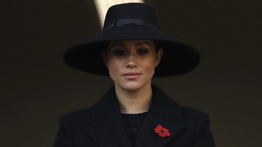 FILE - In this Sunday, Nov. 10, 2019 file photo Meghan, Duchess of Sussex attends the Remembrance Sunday ceremony at the Cenotaph in Whitehall in London. The Duchess of Sussex has revealed that she had a miscarriage in July. Meghan described the experience in an opinion piece in the New York Times on Wednesday. She wrote: 