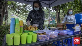 FOTO: Nasi Kuning Pandemi Rp3.000 di Jakarta