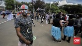 FOTO: Aksi Peringatan 1 Desember Warga Papua di Jakarta Aktivis kemanusiaan dan Warga Papua menggelar aksi peringatan 1 Desember di kawasan Monas, Jakarta menyerukan beberapa tuntutan, salah satunya referendum.