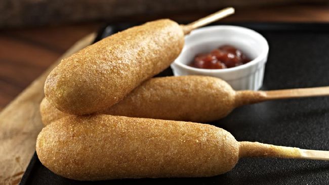 Corn dog semakin populer beberapa waktu terakhir berkat drama Korea Start-Up. Apa sebenarnya corn dog?