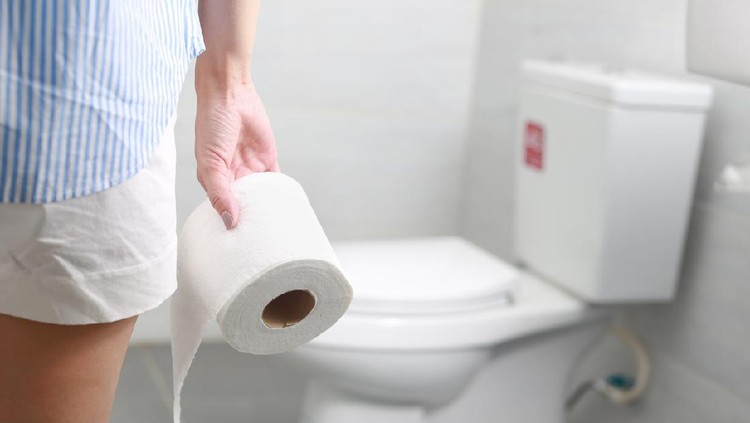 Ilustrasi wanita di toilet