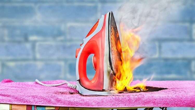 An ignition of an ironing electric iron occurred in the house, when the appliance was left connected to the household power supply for a long time, the clothes iron caught fire and a fire started.
