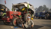 FOTO: Petani India Kepung Ibu Kota Tuntut UU Pertanian Baru Para petani India berdemo memakai truk dan trailer di ibu kota India untuk menuntut UU Pertanian Baru