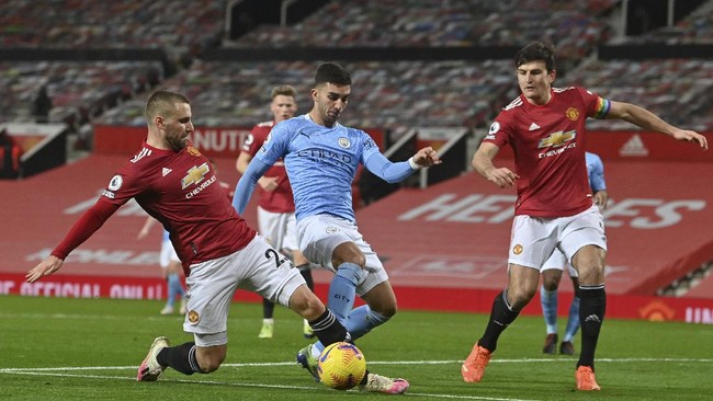 Persaingan Manchester City dan Manchester United di Liga Inggris masih menyisakan 12 laga sisa termasuk empat big match.
