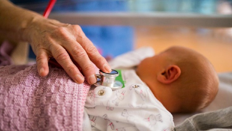Coronavirus and small baby being born. Covid-19 giving birth during isolation. Social distancing with the virus infection during pandemic. Covid pandemic flue and giving birth to babies. covid-19.