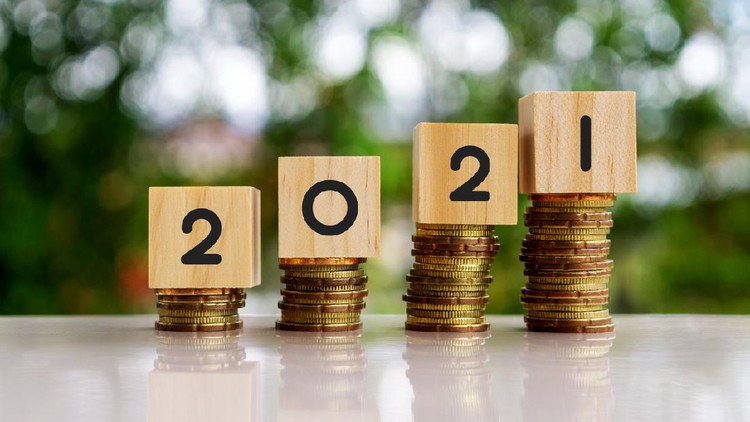 menabung 2021 number on wood block on top of stack of coins