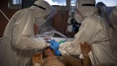 FOTO: Perjuangan Tim Medis Italia di Garda Depan Pandemi Italia saat ini menjadi negara dengan kasus tertinggi di Eropa mencapai 1,8 juta infeksi Covid-19, sekitar 80 ribu diantaranya merupakan petugas medis.