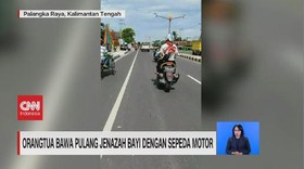 VIDEO: Orangtua Bawa Pulang Jenazah Bayi dengan Sepeda Motor