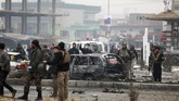 FOTO: Situasi Mencekam Serangan Bom Mobil di Afghanistan Kota Kabul Afganistan kembali diguncang serangan bom mobil, Minggu (20/12), berikut foto-foto situasi menceka pascaledakan.