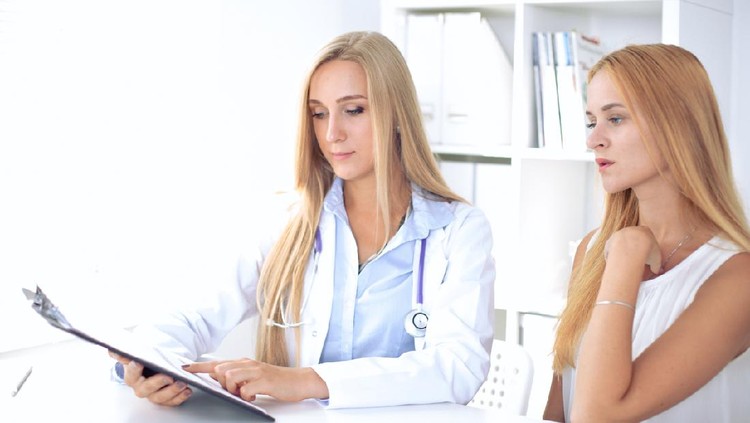 Doctor with patient in hospital. Medicine and health care concept