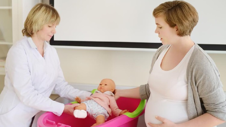 Pregnant woman on lesson courses for expectant mothers. Medical insurance childbearing. Family doctor for gestation. Maternity leave. Pediatrics. Preparing for motherhood.