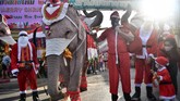 FOTO: Natal di Penjuru Dunia saat Pandemi Warga di penjuru dunia tetap bersuka cita merayakan Hari Natal di tengah pandemi virus corona (covid-19).