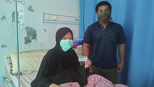 Dengan menggunakan Kartu JKN-KIS, Herniawati mendapat banyak manfaat dengan biaya terjangkau. Salah satunya, kala ia berjuang melawan sakit tumor.