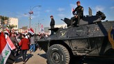 FOTO: Peringatan Setahun Pembunuhan Jenderal Iran Puluhan ribu warga Iran turun ke jalan di kota Teheran untuk memperingati satu tahun kematian Jenderal Qasem Soleimani yang tewas dibunuh oleh Amerika Serikat.