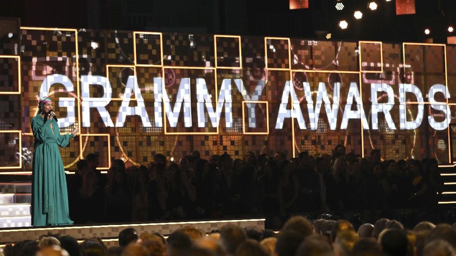 FILE - Host Alicia Keys speaks at the 61st annual Grammy Awards on Feb. 10, 2019, in Los Angeles. The Recording Academy told The Associated Press on Tuesday, Jan. 5, 2021, that the annual show would shift from its original Jan. 31 broadcast to March 14. The Grammys will be held in Los Angeles at the Staples Center. (Photo by Matt Sayles/Invision/AP, File)