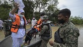 FOTO: Banjir Rendam 4 Daerah di Malaysia saat Pandemi Covid Hujan deras yang melanda Malaysia dalam beberapa hari terakhir merendam empat negara bagian: Johor, Pahang, Perak, Selangor, dan Terengganu.