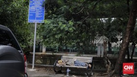 FOTO : Potret Mendung Orang-orang Pinggiran di Jakarta