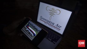 Polisi Kerahkan Kapal dan Helikopter Evakuasi Sriwijaya Air
