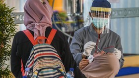 Mengenal Saliva Tes Covid-19, Air Liur Lebih Nyaman dari PCR
