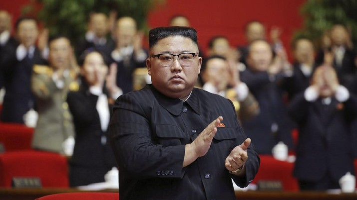 In this photo provided by the North Korean government, North Korean leader Kim Jong Un claps his hands at the ruling party congress in Pyongyang, North Korean, Sunday, Jan. 10, 2021. Kim was given a new title, “general secretary” of the ruling Workers’ Party, formerly held by his late father and grandfather, state media reported Monday, Jan. 11, in what appears to a symbolic move aimed at bolstering his authority amid growing economic challenges. Independent journalists were not given access to cover the event depicted in this image distributed by the North Korean government. The content of this image is as provided and cannot be independently verified. Korean language watermark on image as provided by source reads: 