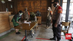 DPR Minta Pemerintah Antisipasi Lonjakan Covid-19 Libur Imlek