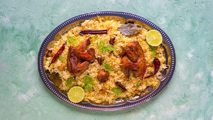 Mandi Kabsa, Yemenis style. Festive dish with baked chicken and rice.