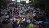 FOTO: Ribuan Migran Honduras Mengejar Mimpi ke Amerika Rribuan orang meninggalkan Honduras menuju AS untuk mengejar kehidupan yang lebih baik di bawah kepemimpinan presiden terpilih Joe Biden.