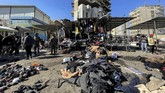 FOTO: Bom Bunuh Diri Guncang Irak, 28 Orang Tewas Sedikitnya 28 orang tewas dan 73 luka-luka dalam ledakan dua bom bunuh diri yang menghantam Baghdad, Irak, Kamis (21/1) pagi.