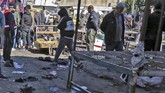 FOTO: Bom Bunuh Diri Guncang Irak, 28 Orang Tewas Sedikitnya 28 orang tewas dan 73 luka-luka dalam ledakan dua bom bunuh diri yang menghantam Baghdad, Irak, Kamis (21/1) pagi.