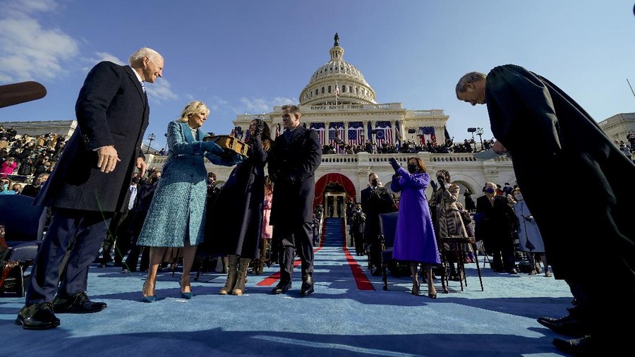 President-elect Joe Biden and his wife Jill Biden arrive at the East Front of the U.S. Capitol ahead of Biden’s inauguration, Wednesday, Jan. 20, 2021, at the U.S. Capitol in Washington. ((Jim Lo Scalzo/Pool Photo via AP)