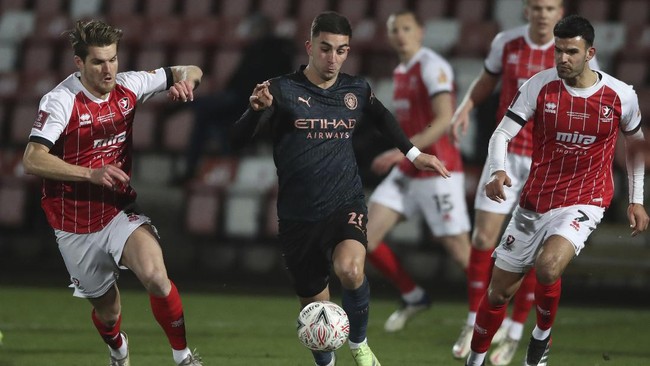 Manchester City berhasil mengalahkan Cheltenham Town di babak keempat Piala FA.