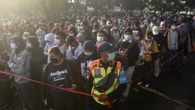 FOTO: Indonesia Tembus 1 Juta Kasus Covid-19