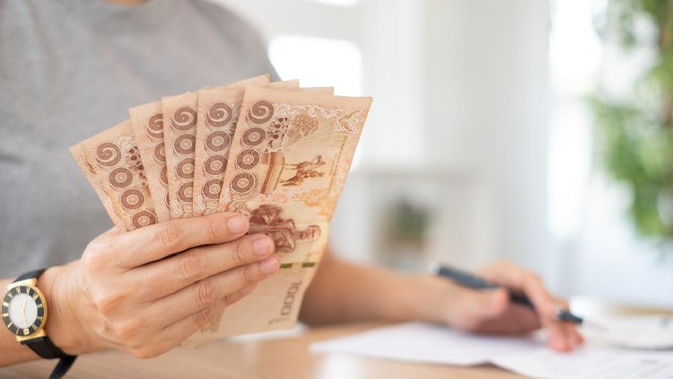 1226132158 women giving thai money banknote. concept of home finance, personal loan,insurance claim,Income compensation.