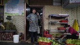 Tim (WHO) menyelidiki asal-usul penyebaran virus corona Covid-19 dengan mengunjungi pasar dan rumah sakit di Wuhan.