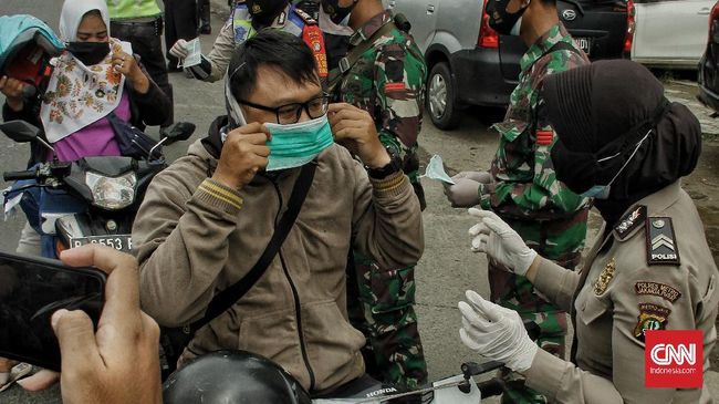 Satgas Covid-19 Edukasi Prokes ke Warga di Palembang - Vimarsana News