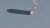 FOTO: Detik-detik Roket Spacex Meledak Prototipe roket SpaceX Starship SN9 tanpa awak yang akan digunakan ke Mars, meledak saat jalani uji coba di Texas, AS, Selasa (2/2).