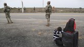 NYALANG: Tawa, Duka dan Warna-warni Dunia Bermain salju di New York dan persiapan Imlek di Shanghai jadi foto terbaik pilihan CNNIndonesia.com pekan ini dalam Nyalang.