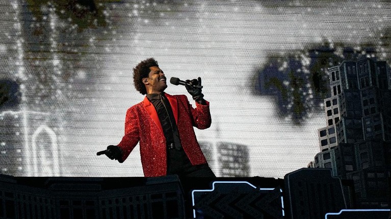 The Weeknd performs during the halftime show of the NFL Super Bowl 55 football game between the Kansas City Chiefs and Tampa Bay Buccaneers, Sunday, Feb. 7, 2021, in Tampa, Fla. (AP Photo/David J. Phillip)